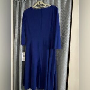 NEW with tags very nice soft dress with zipper on the back